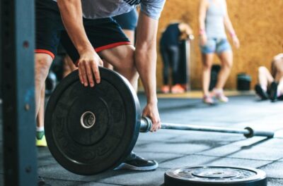 Loading a barbell with weight