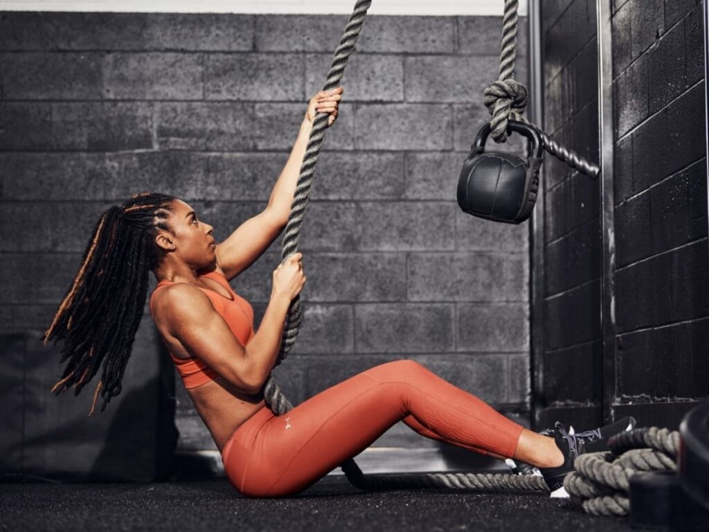 Seated rope pulls with a weight