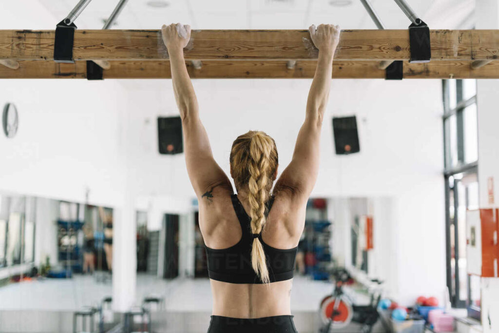 Holding onto a plank of wood for strength