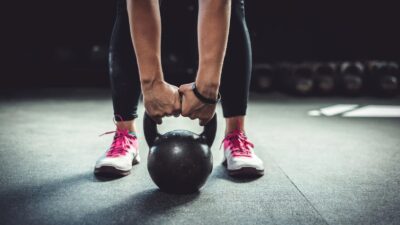 Holding a kettlebell before an exercise