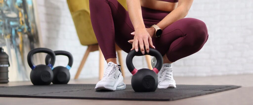 Working out while holding a kettlebell