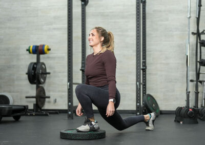 Woman doing split squats