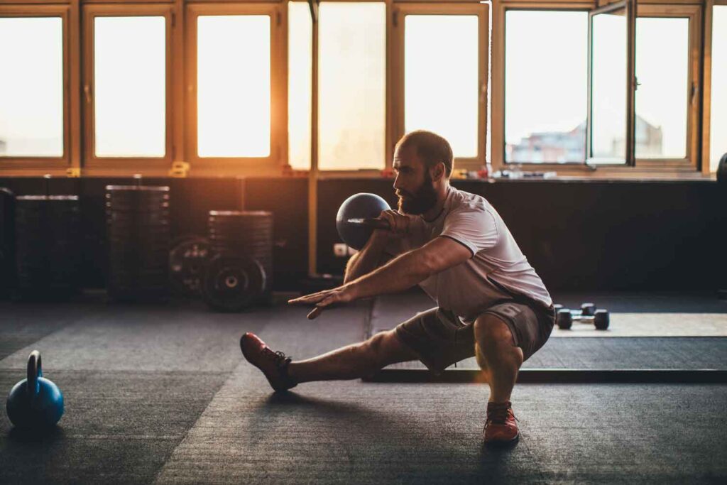 Working out in a less crowded gym at sunset